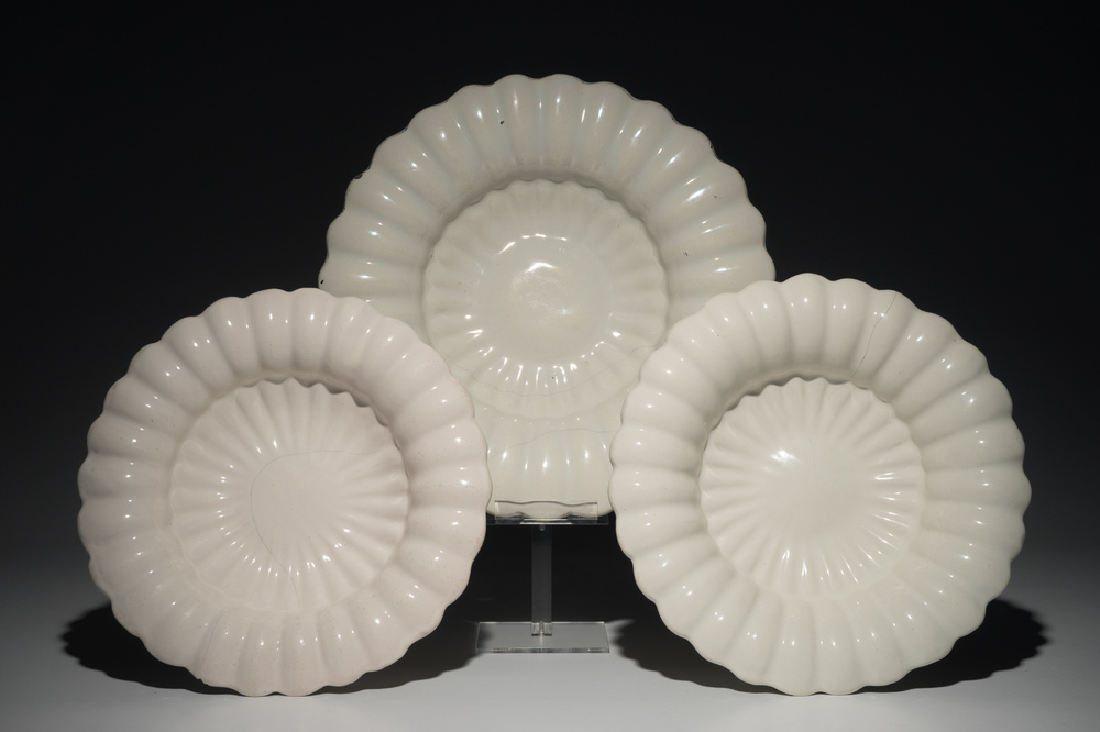 Three white Dutch Delft gadrooned dishes, 17th C.
